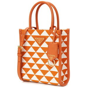 Prada Symbole Orange trim leather Tote pattern Embroidered geometric bag